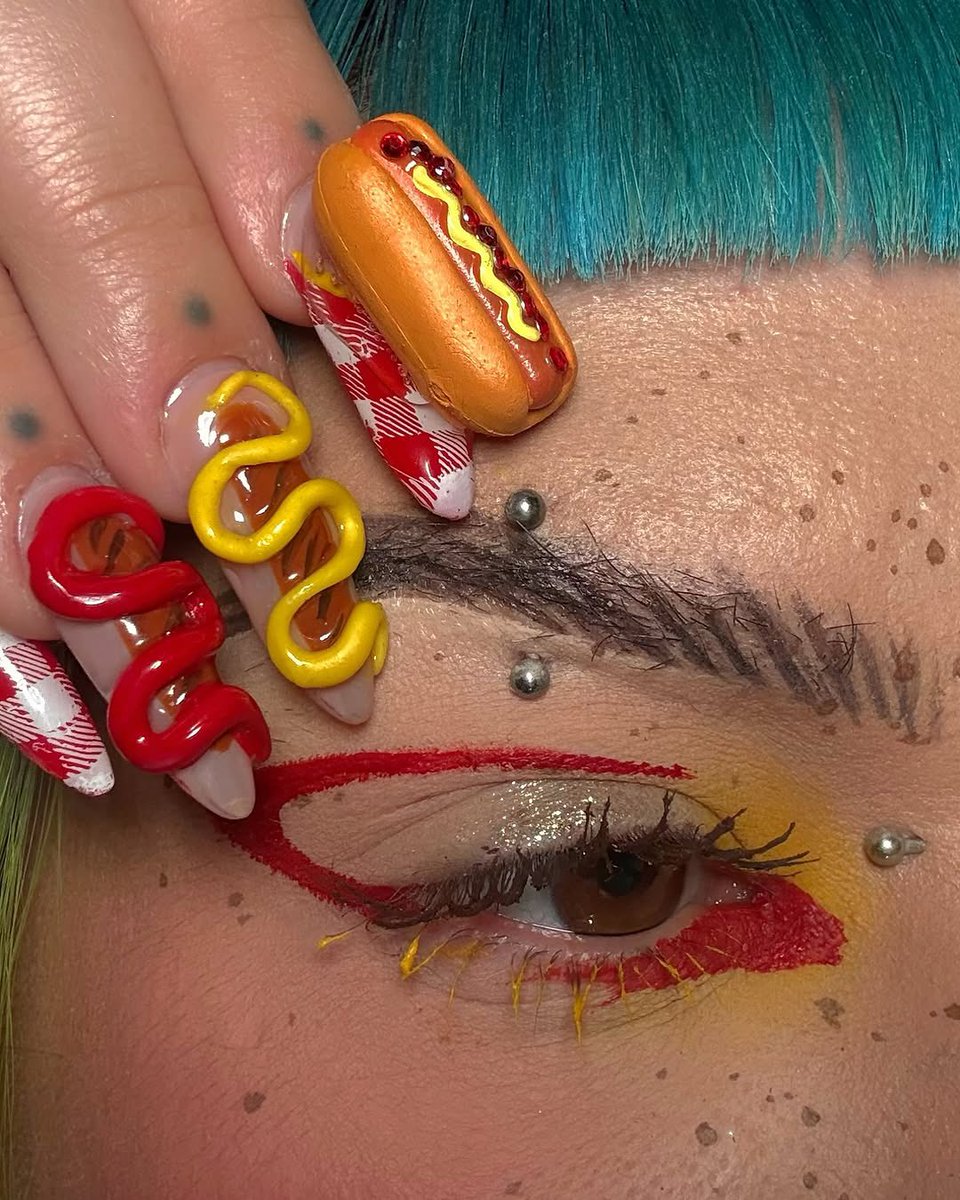 sugarpillmakeup's tweet photo. ❤️ @Cierajewelmua makes us want a hot dog real bad! 🌭 Loving this juicy, mouthwatering makeup using Buttercupcake 💛 eyeshadow, inspired by her epic @badbabesnail.co nails! #sugarpill #graphiceyeliner #ravemakeup #gothmakeup #editorialmakeup #clowncore https://t.co/S45ni9oaOG