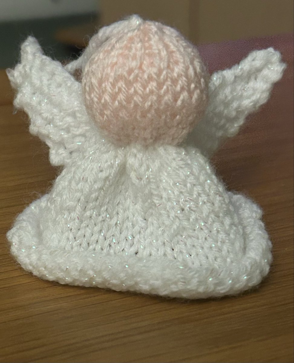 Been knitting some angels recently for a Christmas Fayre.  This one turned out much shorter than the others was is my favourite. (Must have missed a section of the pattern). #Knitting.
