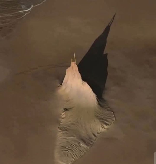 An actual mountain on Jupiter's moon lo
by NASA Juno during a flyby