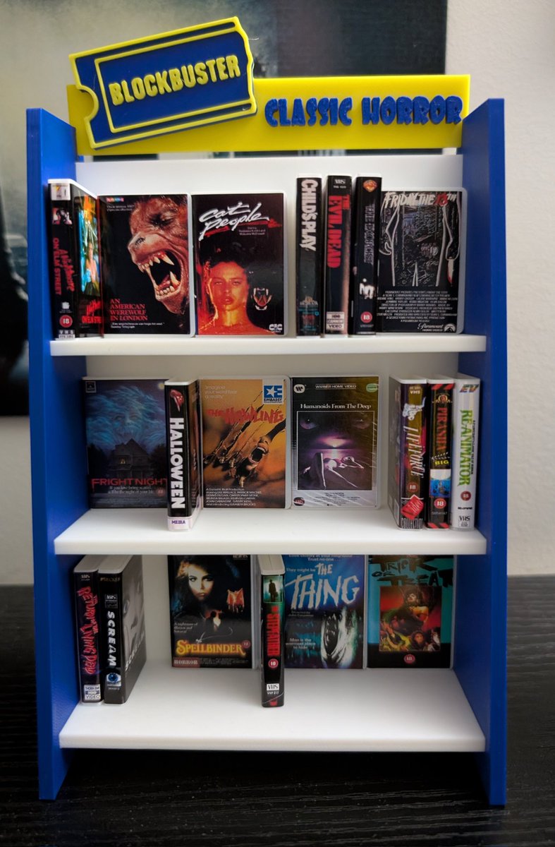 My shelf is going back in time with mini-Blockbuster.