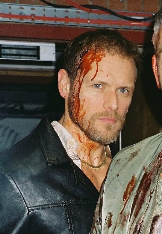 Sam Heughan covered in blood, that’s all