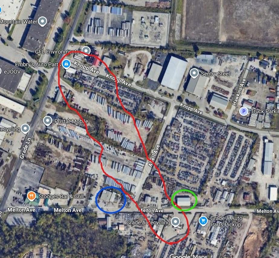 SamBoyd's tweet image. Here is a rough outline of what is currently burning after the  UPS plane crash. You can see the two reference buildings in the circles. Overall, it mostly appears to have hit parking areas for trailers &amp;amp; vehicles but at least two or three buildings.