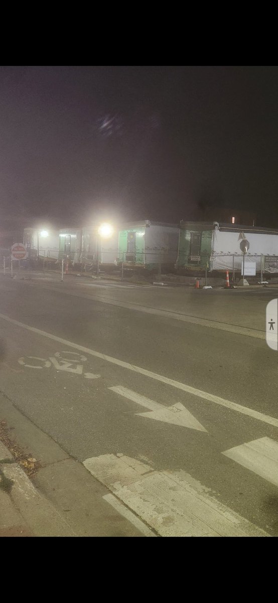 Traverse City Higher Income Housing begins with stackable units... assembled in dark of night