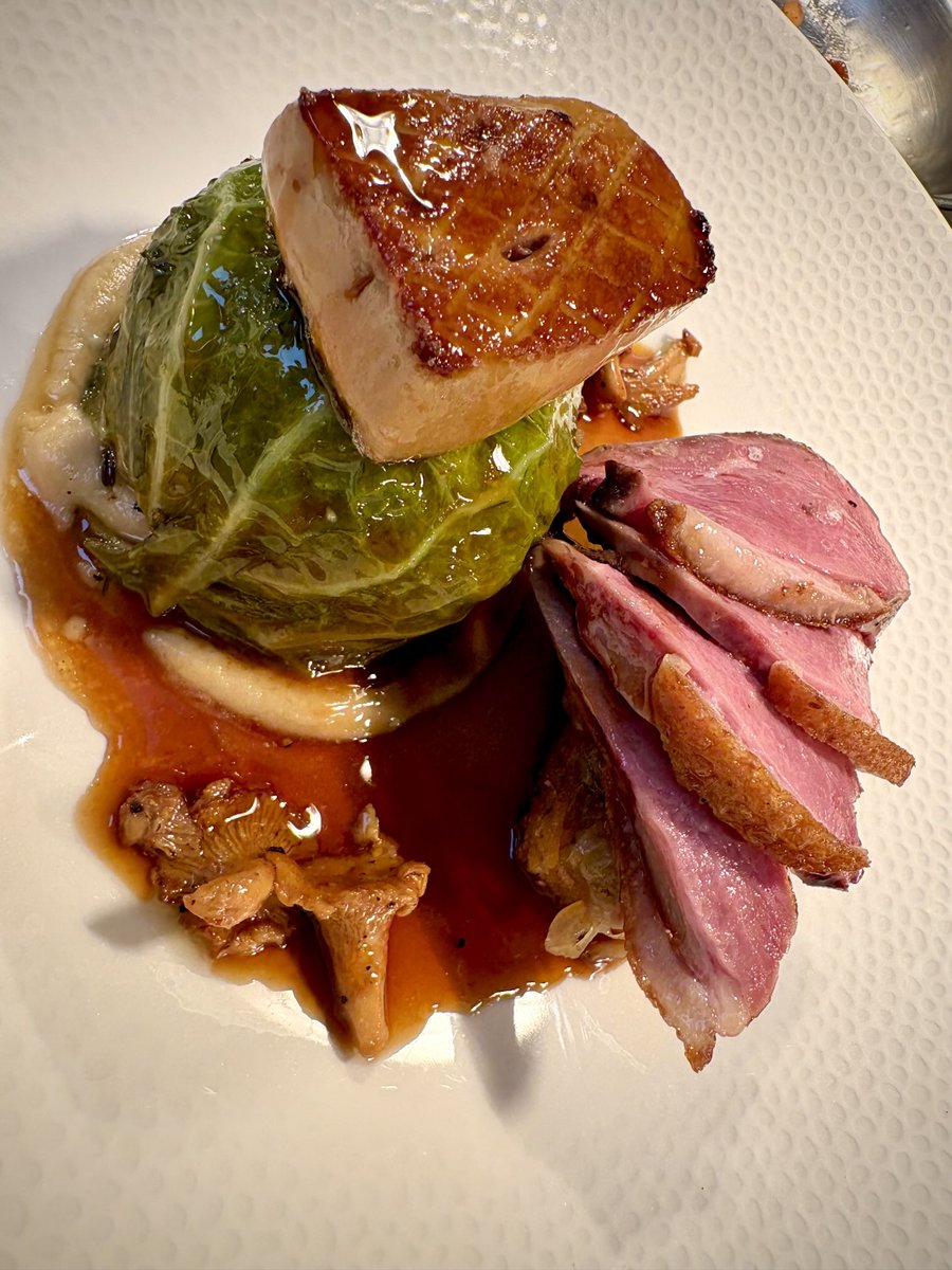Chou farci, rösti Lyonnaise hiding under some duck, girolles