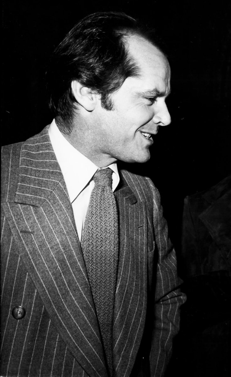 Nicholson in a beautiful chalk stripe. 

I like this for a sophisticated, social suit. 

The fabric has a subtle twill texture and a light, fuzzy nap. Easy on the eyes. 

Long collar points, knit tie. 

Stripes on the collar line up with the stripes on the lapel.