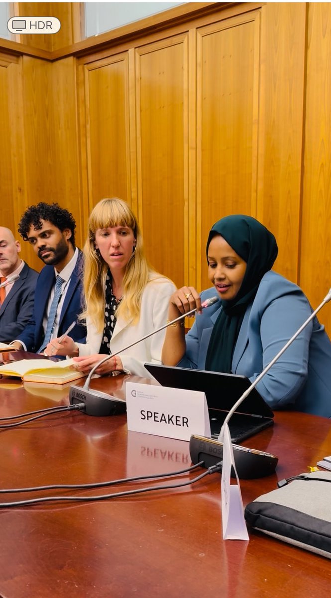 RadioMuqdisho's tweet photo. Somalia’s delegation led by Minister of Environment and ClimateChange @BashirMJ joined the #BCSC2025 in Berlin. Speaking on a panel, Ms. @ayanthecritique underscored that #ClimateFinance can strengthen peace and resilience, noting Somalia’s call to treat #ClimateChange as both an environmental and security challenge.