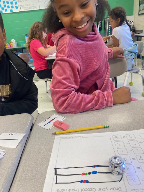 EESeaglesPCS's tweet image. 3rd graders solved division problems to earn bits of code for their Ozobots! 🤖➗ Each correct answer unlocked a new move, helping their bot complete the course. Math, logic, and coding all in one engaging challenge! 💡 #STEM @PCS_STEM @Ozobot