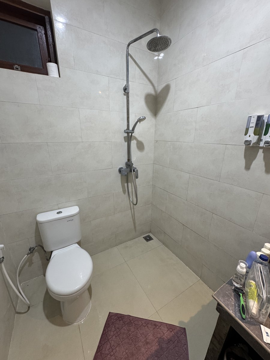 For it to be a shower you can’t just spray the water, you have to contain it

Unfortunately some people don’t know that