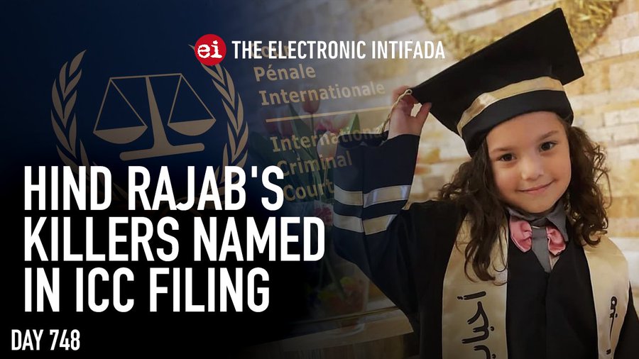 A young girl with curly hair wearing a black graduation cap and gown with gold trim holds a diploma, smiling and looking at the camera against a beige brick wall. Overlaid text reads Hind Rajabs killers named in ICC filing in bold white and red fonts. The Electronic Intifada logo appears in the top left with a red background and scales of justice icon. Additional text includes Day 748 International Criminal Court.