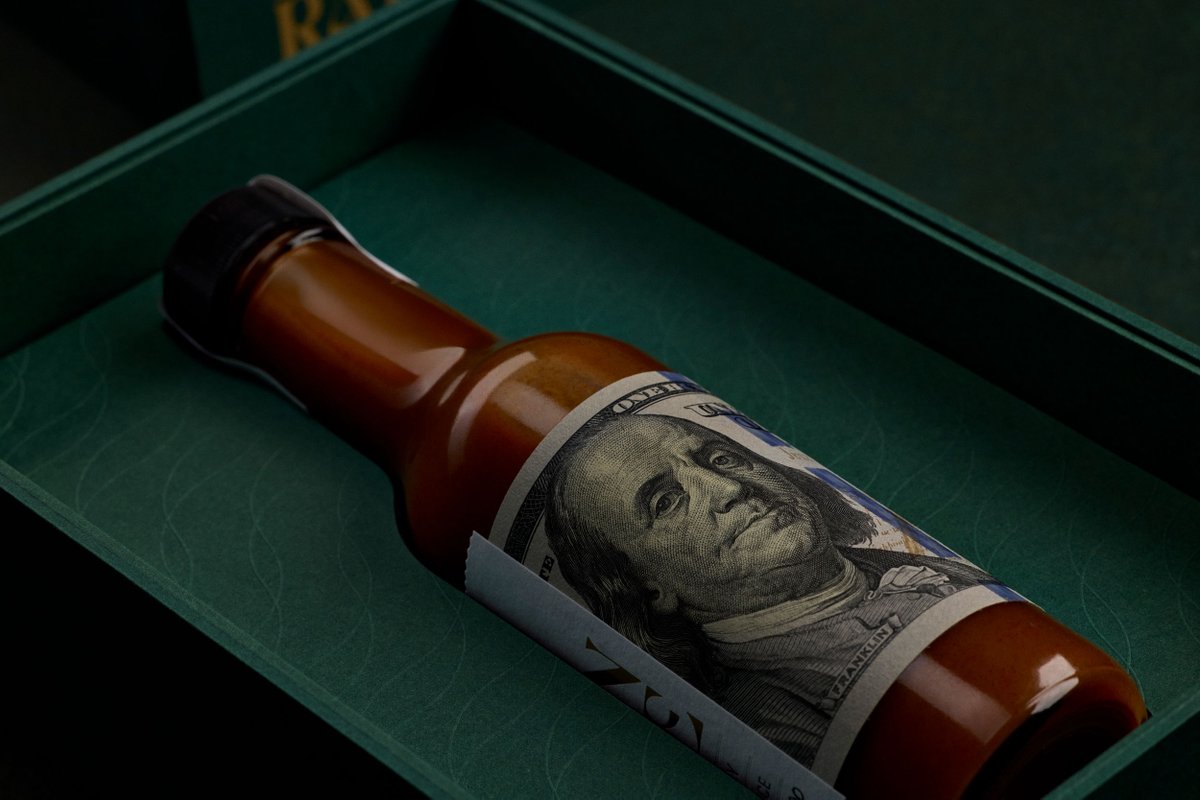 Really excited to share the latest creative project I've been working on—Burn Rate Hot Sauce.

Yes that's a $100 bill wrapped around the bottle. And yes it's selling it for $13.99.

Available for a limited time at burnrate.cash