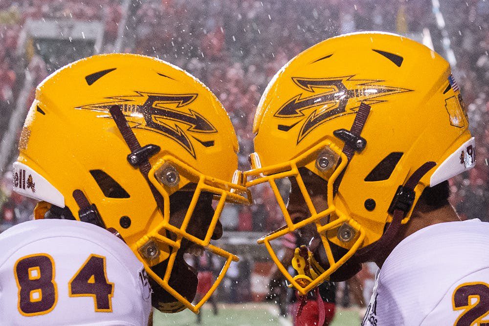 GridironComics's tweet photo. @ASUFootball @GrahamRossini I humbly request that someone do something about this trend of having the outer color of the helmet decal be the same color as the helmet. It makes half the logo disappear! Solutions could be a contrasting outer color, or a thin contrasting outline on the decal https://t.co/ieFRT3GfVH