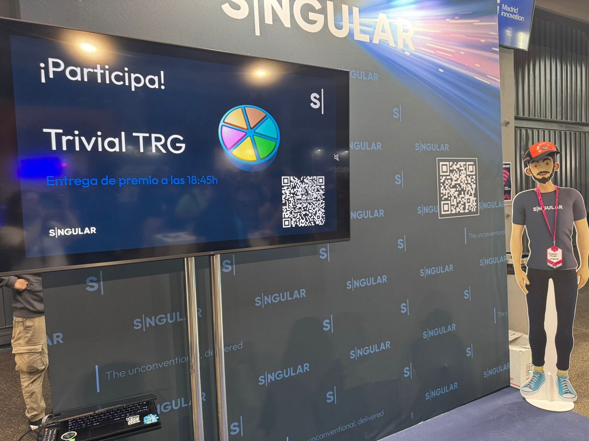 ¡Aprovechad el parón del café para pasaros por el stand de <a href="/sngular/">Sngular</a> y poneros a prueba con su Trivial y conocer a su asistente Alfred! #TRGx