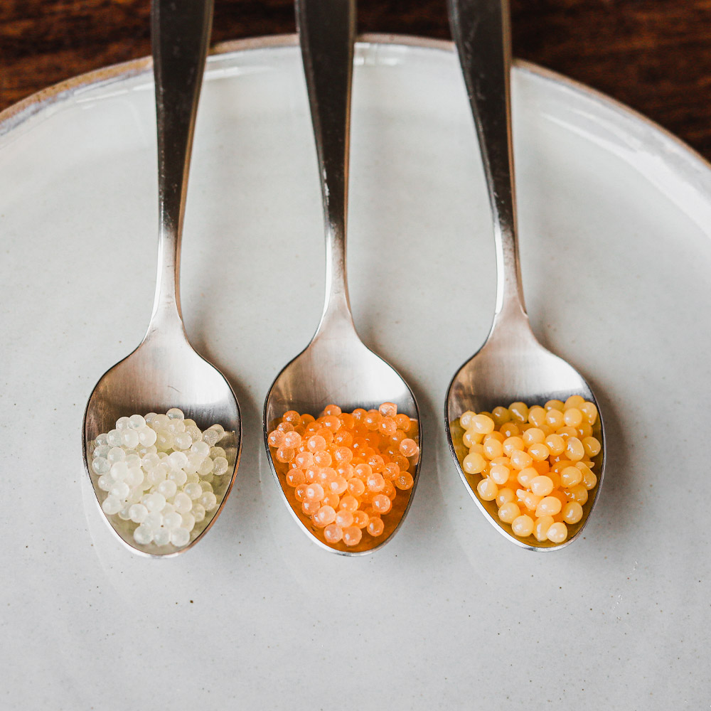 spherificator's tweet image. Pick your pearl, pick your flavor. Sweet, zesty, or tangy, these tiny bursts are anything but ordinary 🥄✨ #FlavorPearls #TinyFlavorBombs #Spherificator #TheSpherificator #Spherification #MolecularGastronomy #NextLevelGarnish #CreativeCuisine #GourmetTwist #PopOfFlavor