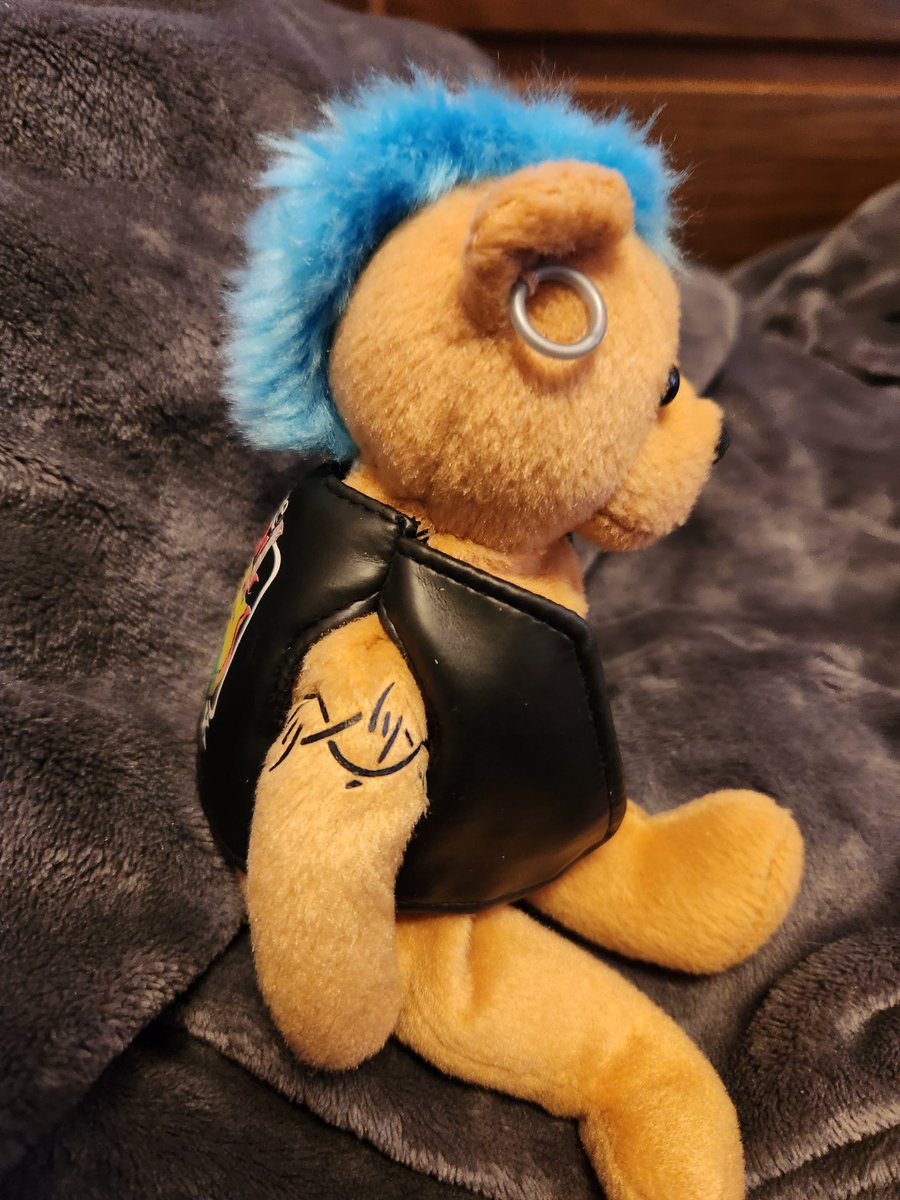 This fellow just showed up at our door because he heard Girl has been wanting a "punk bear".
But unfortunately, he doesn't have a name. We are trying to think of a good punk rock name for him but we are struggling. What do you guys think?