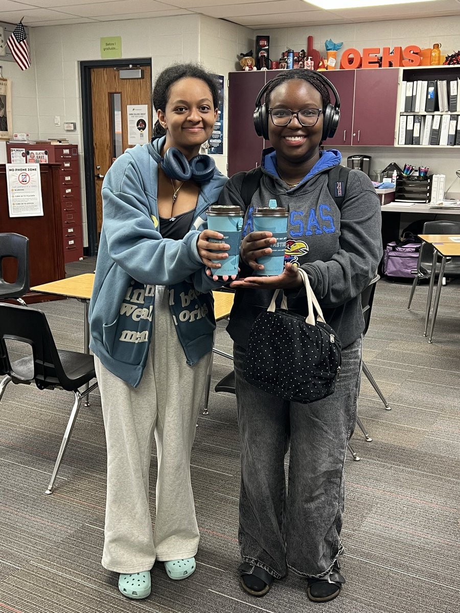 Kerry282542's tweet photo. These two “caffeine fairies” have been delivering coffee to our English staff. Even bringing their favorite flavors!  This kindness is always needed in the world and I’m so proud their Hawks!@OEHawkTalkers @OlatheEastHawks https://t.co/RHA42bqKGB
