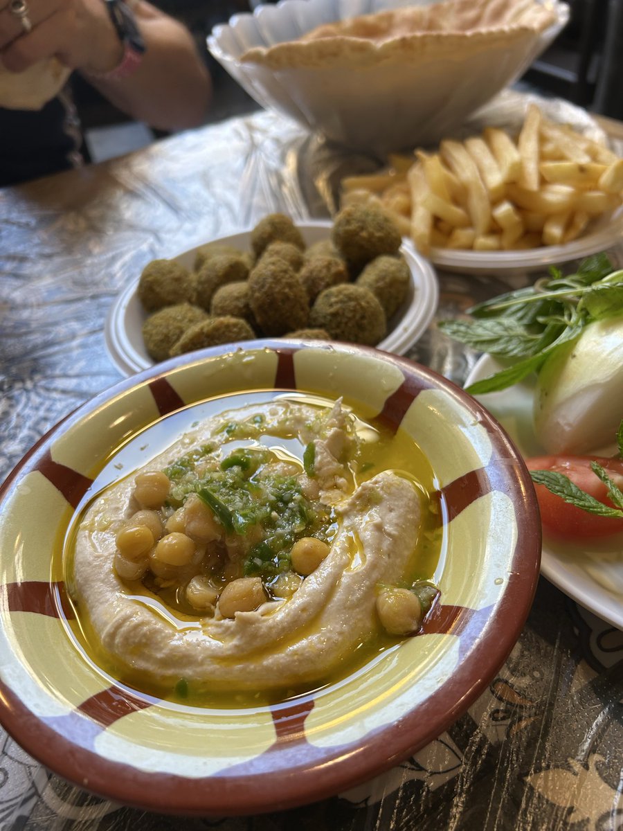 A feast for 4 dinars ( £4.50) at the legendary Hashem restaurant in downtown Amman - all the falafel yiu can eat, delicious creamy hummus, fresh soft bread &amp; local versions of coke &amp; sprite- cheap date or what?