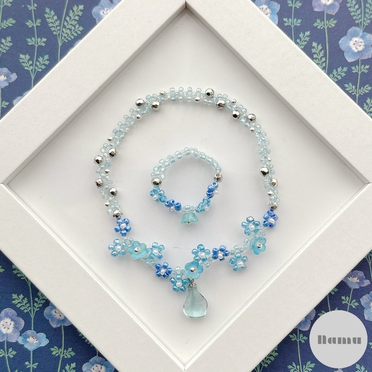 n_a_m_u_76's tweet image. Nemophila🌼☁️

blue💙×silver🩶

#Namu #handmade #beads #seaglass #Nemophila #ネモフィラ