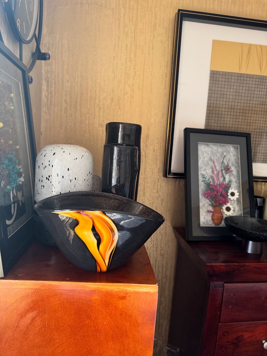 EdemaEnterpris1's tweet photo. Make a dramatic statement with this lava-inspired ceramic vase set. Featuring glossy black finishes with vibrant orange molten streaks, these vases bring sophisticated edge to any space. https://t.co/QvUscKPqjx
