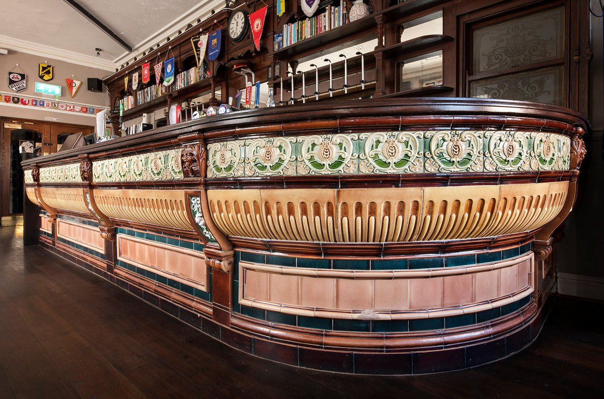 The Horse and Jockey in Wednesbury is an ornate 19th-century pub with a splendid ceramic-fronted bar counter. ✨

The extravagant bar counter was most likely manufactured by Craven Dunnil of Jackfield and is one of only 12 known examples remaining in England.