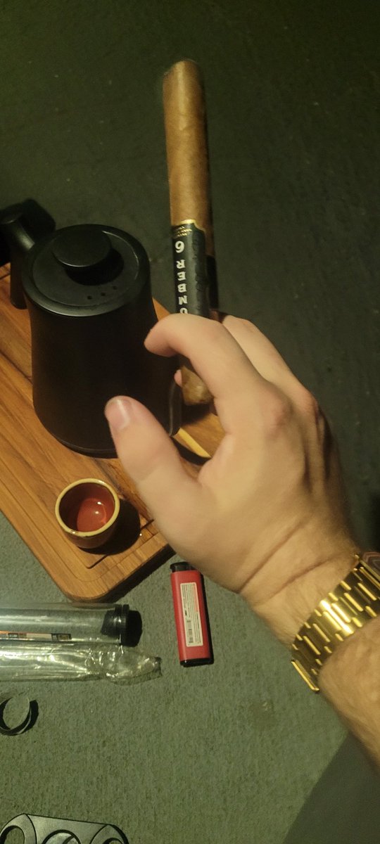corey_president's tweet photo. New watch, smooth cigar, and a warm kettle full of sake for the end of the work week whilst sitting on my porch https://t.co/hrS8JrkGDX
