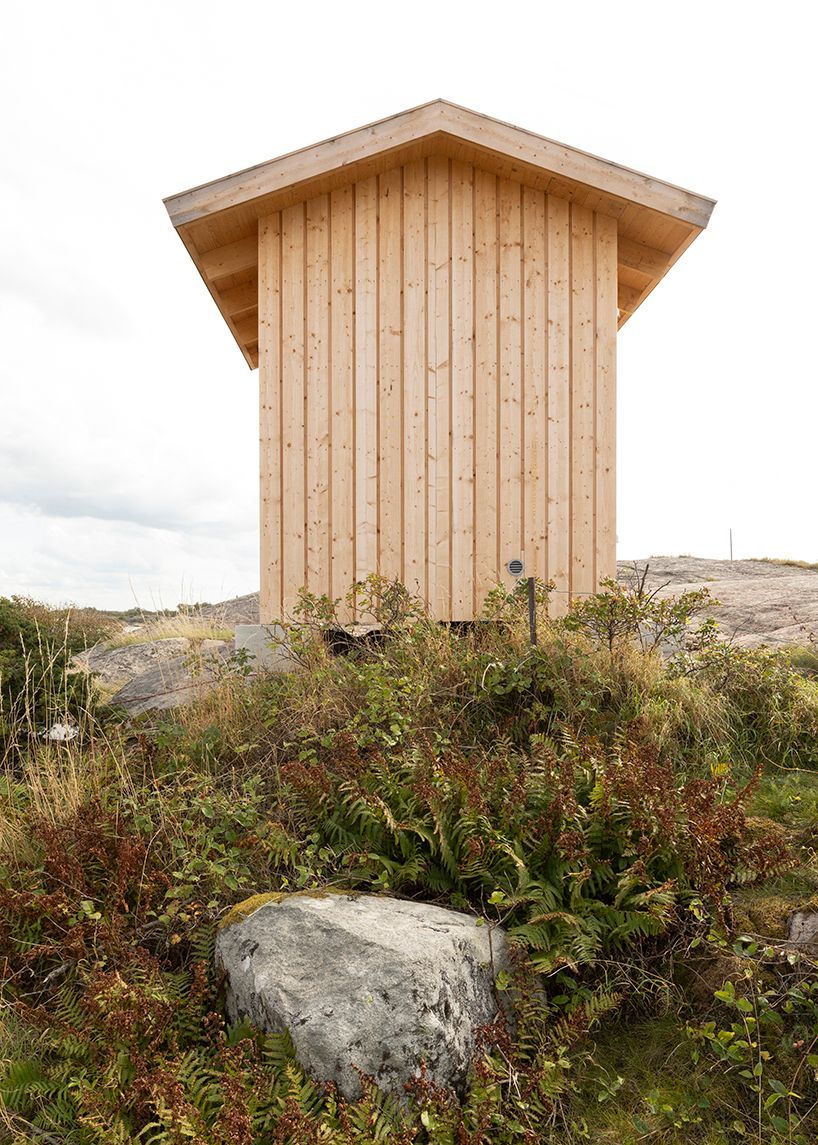 designboom's tweet photo. untreated wooden cladding wraps vernacular sauna sövall on sweden's rocky shoreline https://t.co/AFv3BkMLP5 https://t.co/bST2RTifxM