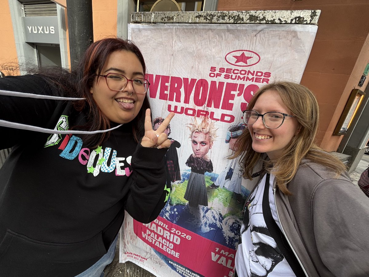 found 5sos in madrid while walking around in our sidequest merch 🫡💗