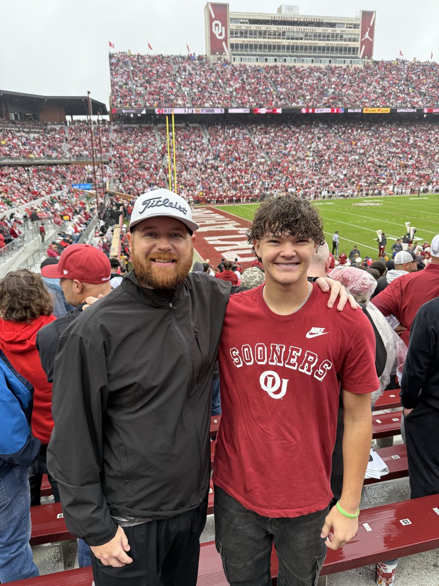 Me and Brady out here in the rain supporting his team! #Sooners #OleMiss  #HookEm