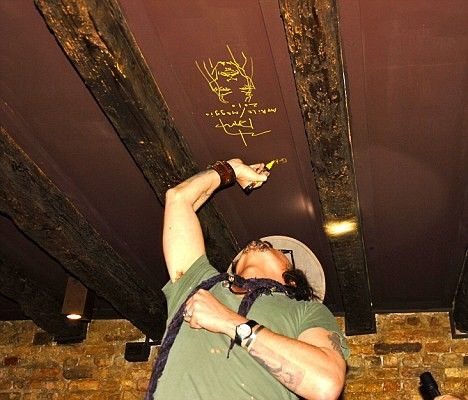 #JohnnyDepp signing the ceiling of Boulder County, Colorado