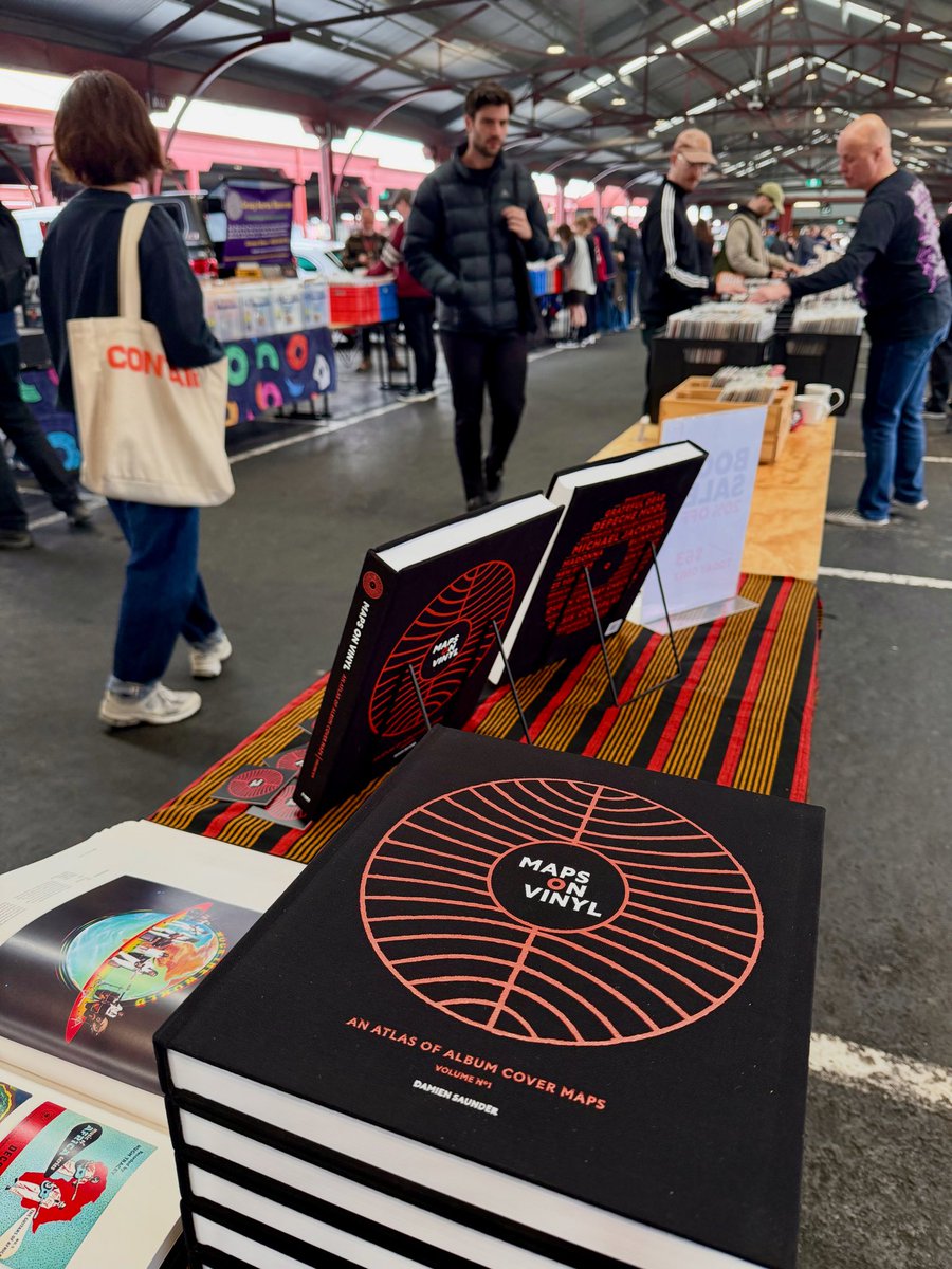 DamienSaunder's tweet photo. We’re underway at the Queen Victoria Market Record Fair! 🎶 Come say hi, flip through some vinyl, and check out Maps on Vinyl — celebrating the art of music and maps from 1939 to today. https://t.co/ApoyTGstdI
