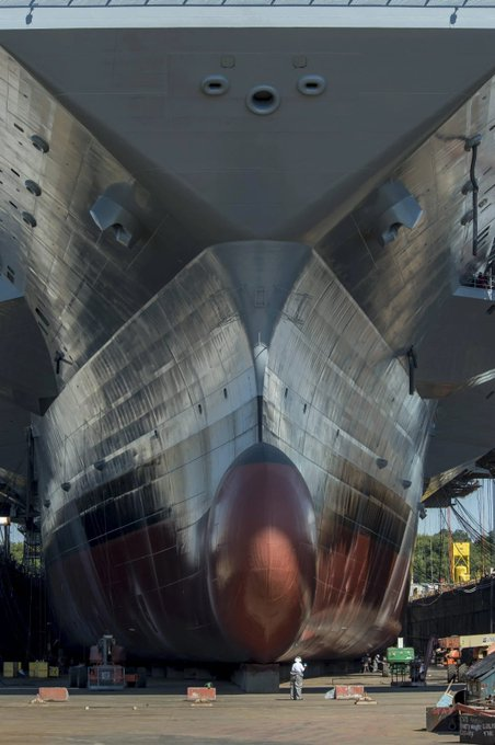 Sheri_Quinn_98's tweet photo. The USS Gerald R. Ford (CVN-78) is the lead aircraft carrier of its class in the United States Navy. This photo, taken in dry dock at the Norfolk Naval Shipyard, illustrates its scale relative to a human.
#GeraldR.Ford#AircraftCarrier
#CVN-78#Shipyard#DryDock https://t.co/hUXBhiqJoO