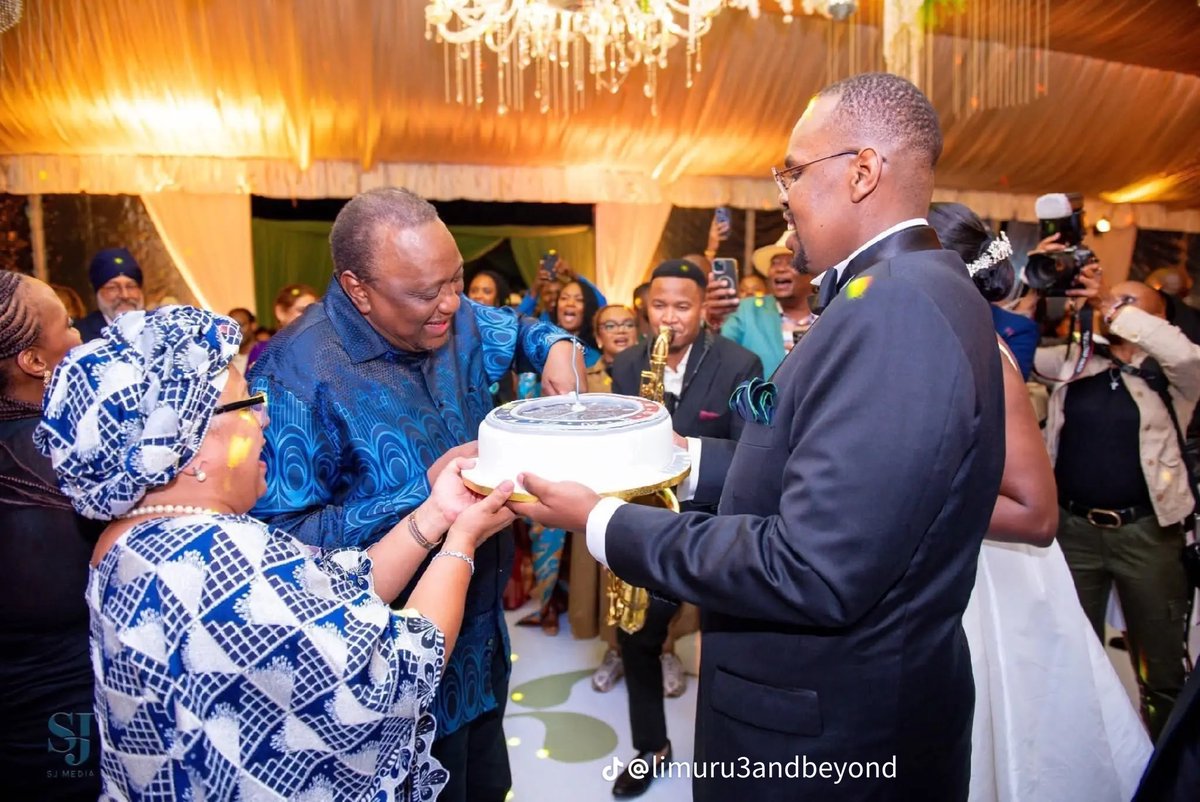 jimNjue_'s tweet image. Former President Uhuru couldn't believe his eyes when he attended a wedding, only to be surprised with a cake to celebrate his 64th birthday.