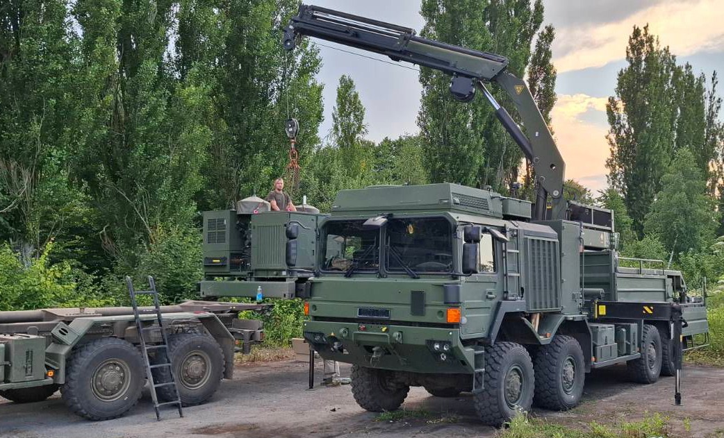 deaidua's tweet image. The 11th Anti-Aircraft Missile Brigade has shared very rare images of an IRIS-T SLM reload vehicle with us (this marks the 4th time I've seen such a vehicle in Ukraine in 3 years). Vadym, who can be seen in the images, states that he mostly transports missiles at night.