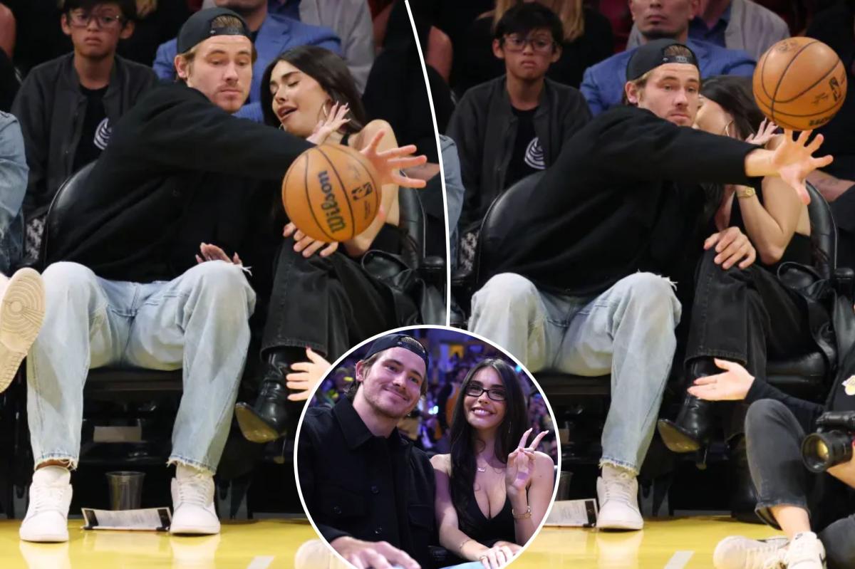 nypost's tweet photo. NFL star Justin Herbert saves pop star girlfriend Madison Beer from flying basketball at Lakers game https://t.co/EHlnkO8mlZ https://t.co/W11IpZRoKg