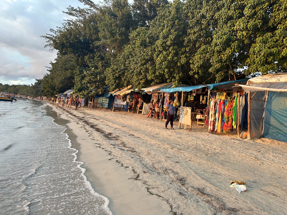 Simcoe12_Wx's tweet image. Crazy to think that a Category 4+ hurricane will be impacting Jamaica. The livelihood of so many will be forever impacted, this is a picture I took in January of 2024. These are the stores and homes of many people, and it’s just mere inches from the ocean at high tide.