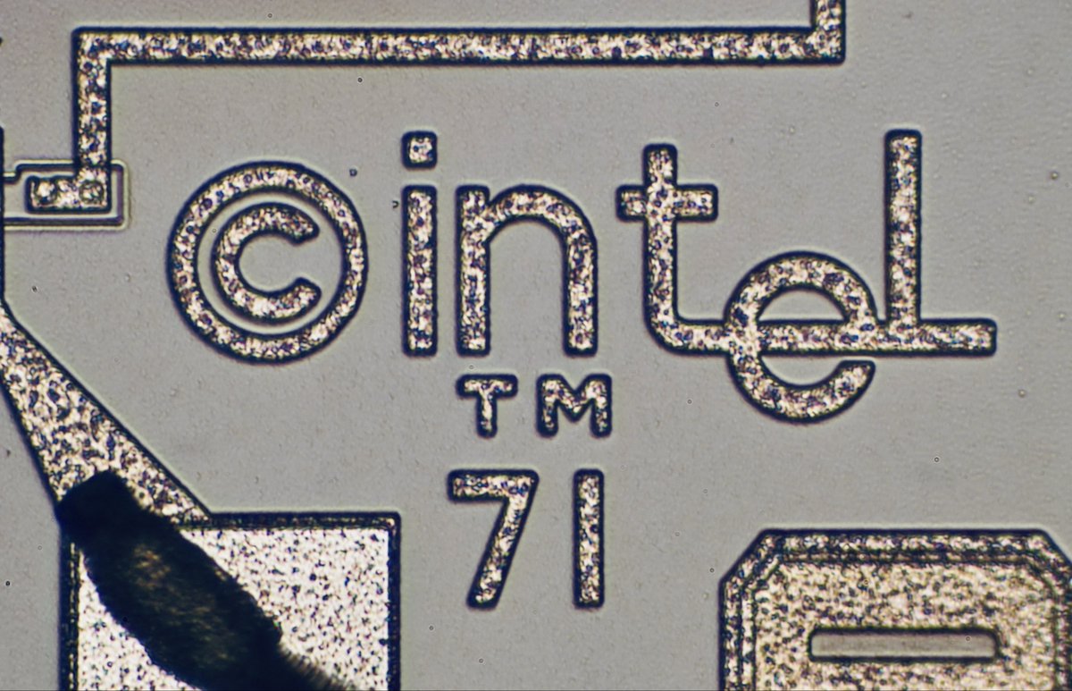 The first commercial single-chip CPU!
It’s time to have a closer look using a metallurgical microscope!
The chip is actually part of the 4000 family with the members 4001-ROM chip, 4002-DRAM, 4003- I/O chip, and the 4004 CPU.
The Intel logo was often used but never so large!