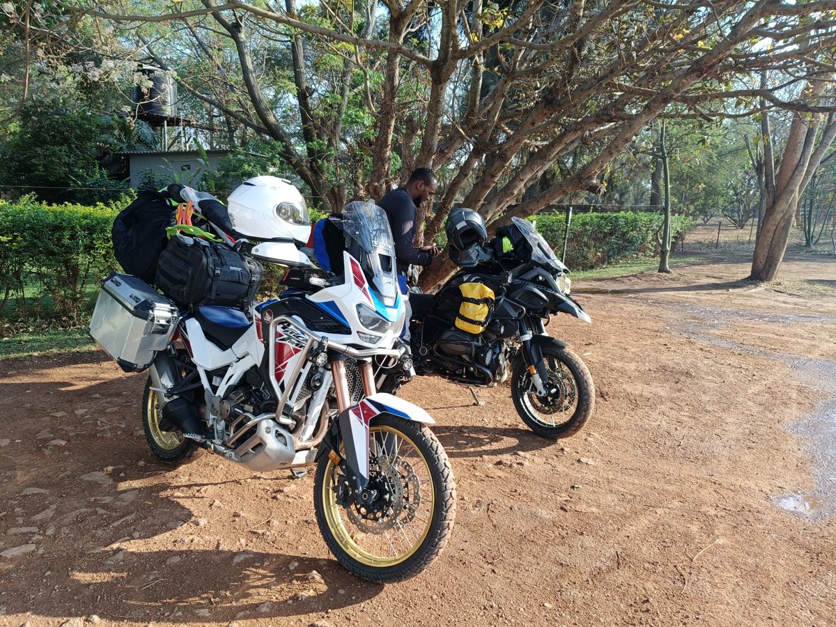 On escort duties, guiding a biker from Kenya through the labyrinthine roads (and no-roads) of Zambia. A pit stop at Fig Tree Cafe for late lunch. On the broken asphalt (and off it), the GSA struggled, and the Africa Twin shone.
