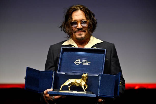 Johnny Depp received the Lifetime Achievement Award on stage during the award ceremony at the 19th Rome Film Festival, held at Sala Petrassi in Rome, Italy, on October 26, 2024 (📸 Antonio Masiello).