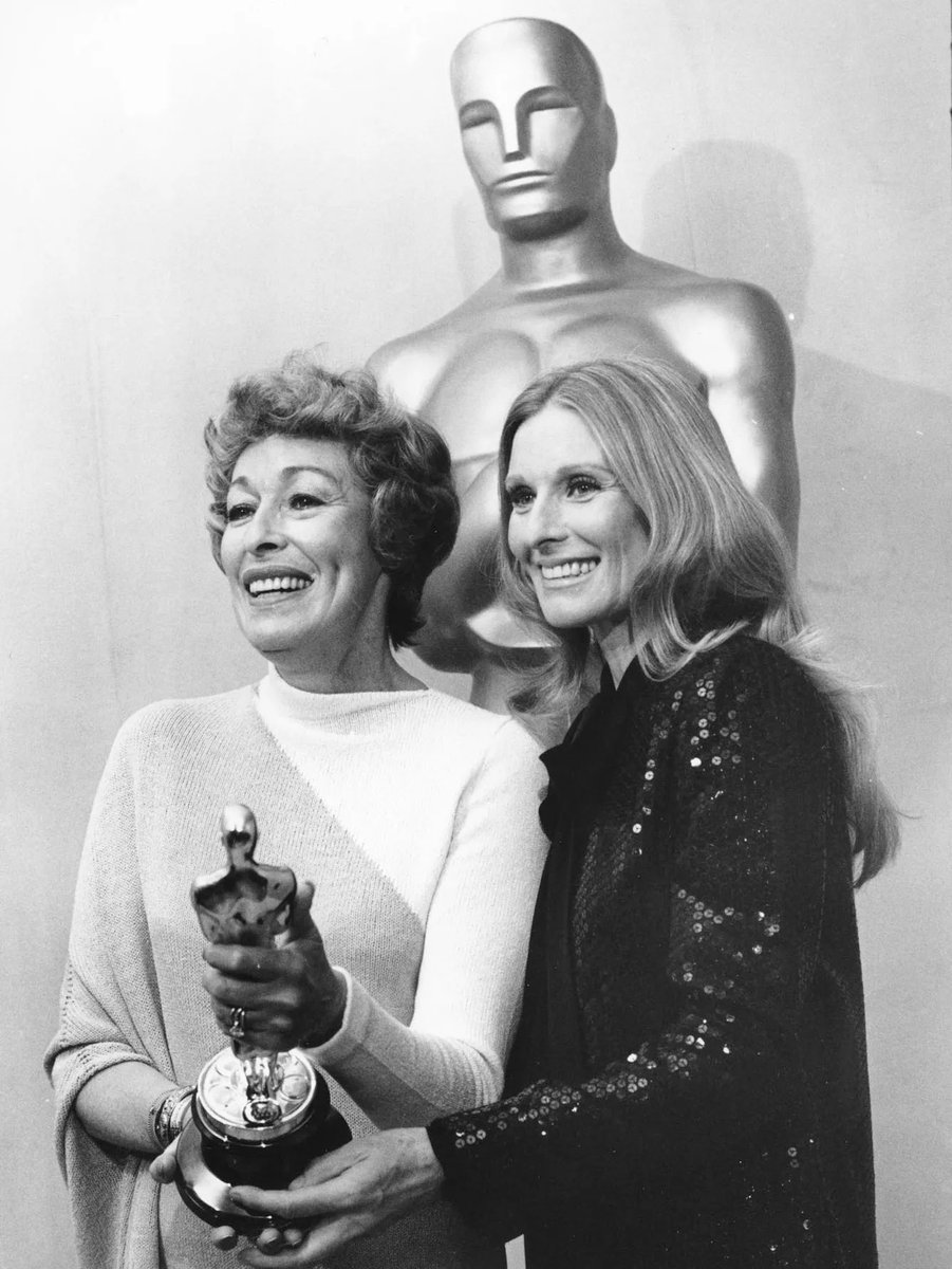 We discuss the Oscar night win for Eileen Heckert with son Luke Yankee and the “biting” presentation speech that followed her learning she had won. Who’s with Eileen in the photo?