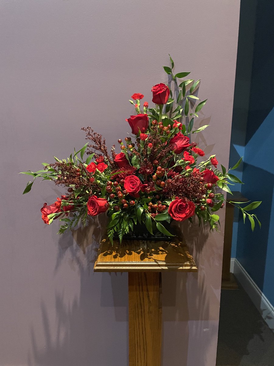 Today was “Reformation  Sunday”. The colors of the day were red. Roses, carnations, and mums in red and burgundy. I’m not always pleased with my work, but today was pretty good.