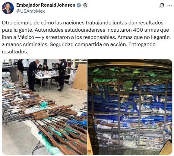 Two side-by-side photos depict a law enforcement operation. The left image shows several officials in suits and uniforms standing around a table covered with plastic-wrapped bundles containing firearms, with US and Mexican flags visible in the background. The right image displays a large stack of assorted rifles and handguns, some wrapped in blue plastic and others loose, piled on the floor in a warehouse setting. The scene includes elements identifying the involvement of US Ambassador Ronald Johnson and Mexican authorities in the arms seizure.