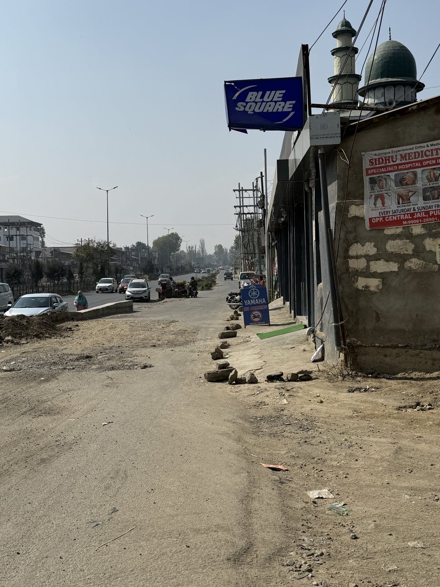 99_ishu's tweet photo. Looks like the service lane outside Ahmed’s Hospital Bypass is on rent now.
Pedestrians can try their luck on the main road! 🚶‍♂️🚗 https://t.co/BeMn3xNXQr