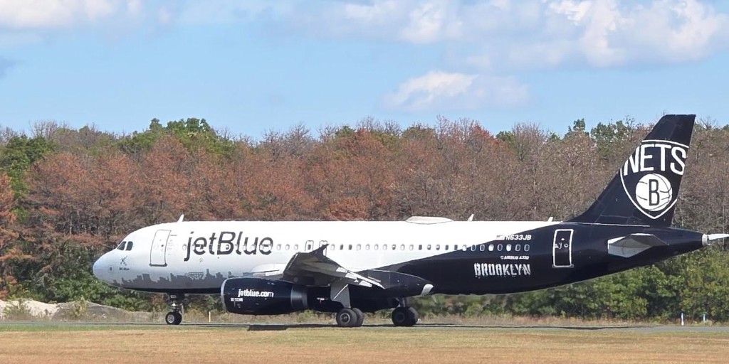 What's white &amp; black &amp; <a href="/JetBlue/">JetBlue</a> all over? You got it... the Brooklyn Nets special livery. 
🖤🤍💙🏀✈️  BK Blue looks especially FLY with the changing color autumn leaves beyond. What's your favorite JetBlue special livery? 👇

#flymacarthur #longislandny #travelfinds #onlyatisp