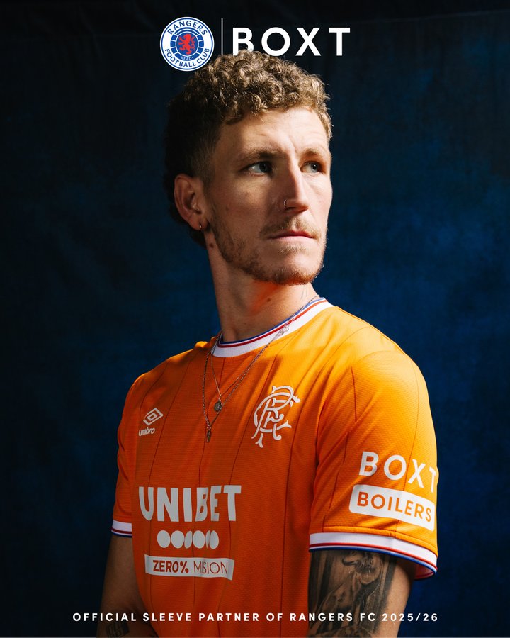 Image: https://pbs.twimg.com/media/G4Qc9iEX0AAoz6v?format=jpg&name=900x900 A male model with curly hair and an earring stands against a blue background wearing an orange Rangers FC fourth kit jersey with white accents on the collar and sleeves The jersey features Umbro logo on the right chest Rangers FC crest on the left chest Boxt sponsor text on the right sleeve Unibet sponsor logo on the front and Zero Moon branding on the left sleeve Text overlays include Official Sleeve Partner of Rangers FC 202526 and Boxt branding at the top
