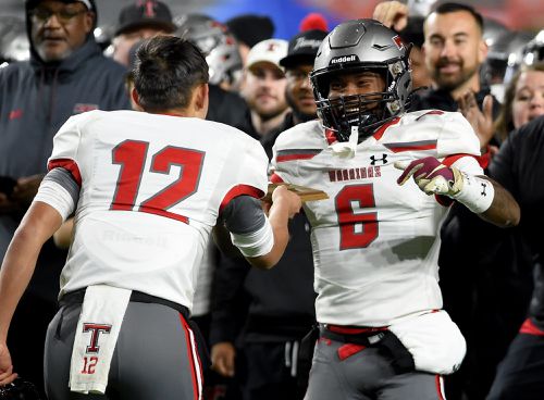 There have been a lot of special moments on the field, but what I'm most proud of with my son happened AFTER the state championship when he handed his MVP award to his senior wide receiver who caught 4 of Trent's 5 TD passes that night. 

Watching it on the jumbotron that night I