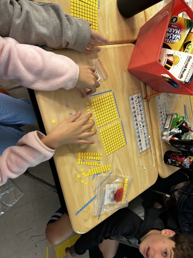 Using manipulatives to build multiplication arrays to solve 2-digit by 2-digit multiplication problems! <a href="/LISShines/">LIS Shines</a>