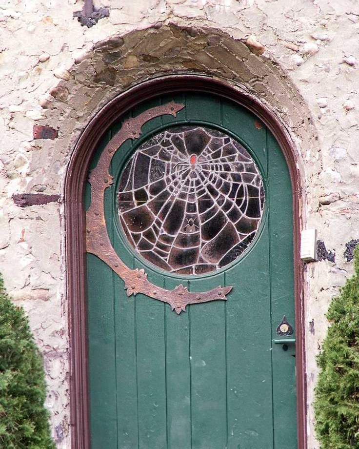 Leaded stained glass spiderweb door