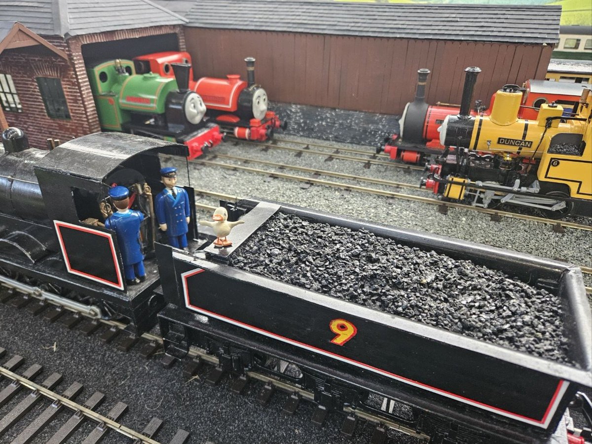 Busy time at Crovan's Gate. 

SR Engines Nos.2 &amp; 6 sit in the yard preparing for work, as Nos.1 &amp; 4 rest in the morning sun.
SR Nos.7 &amp; 3 are already at work.

NWR No.9 Donald stands in front, accompanied by duck 'Dilly'.

One of the tableaus we featured at Exeter Garden Rly Show