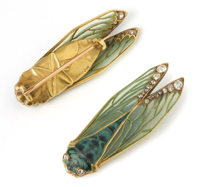 Cicada brooch. Artist: René Lalique, France. Date: c. 1902 AD. Medium: gold with plique‑à‑jour enamel, diamonds, and molded glass. 

Art Nouveau prized living forms, and Lalique built a new kind of jewelry from them, working as freely with enamel, horn, ivory, glass, and