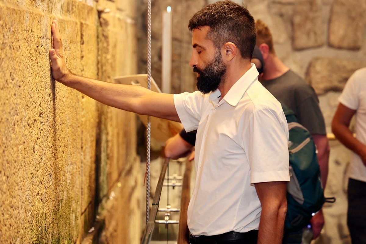 MosabHasanYOSEF's tweet image. Just beneath the Western Wall, twenty meters below where roots weave into bedrock, I pressed my palm against stone older than exile.
No chants, no crowds, only history’s quiet hum. Foundation stones from Solomon’s era and Herod’s expansions stand undeniable, too solid for…