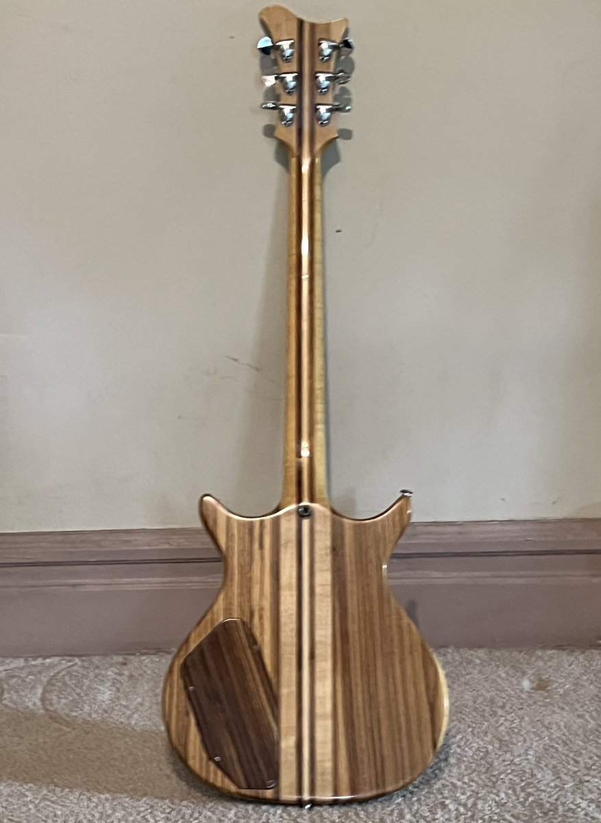 #GuitarsAnOldFriendCameByToVisitWithAGuitarIBuiltForHimBackIn1980.ZebraWoodWithNeckThroughBody